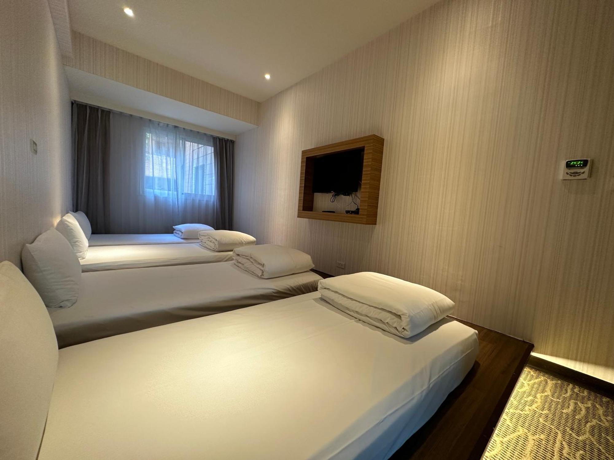 Young Soarlan Hotel - Тайнан Екстериор снимка